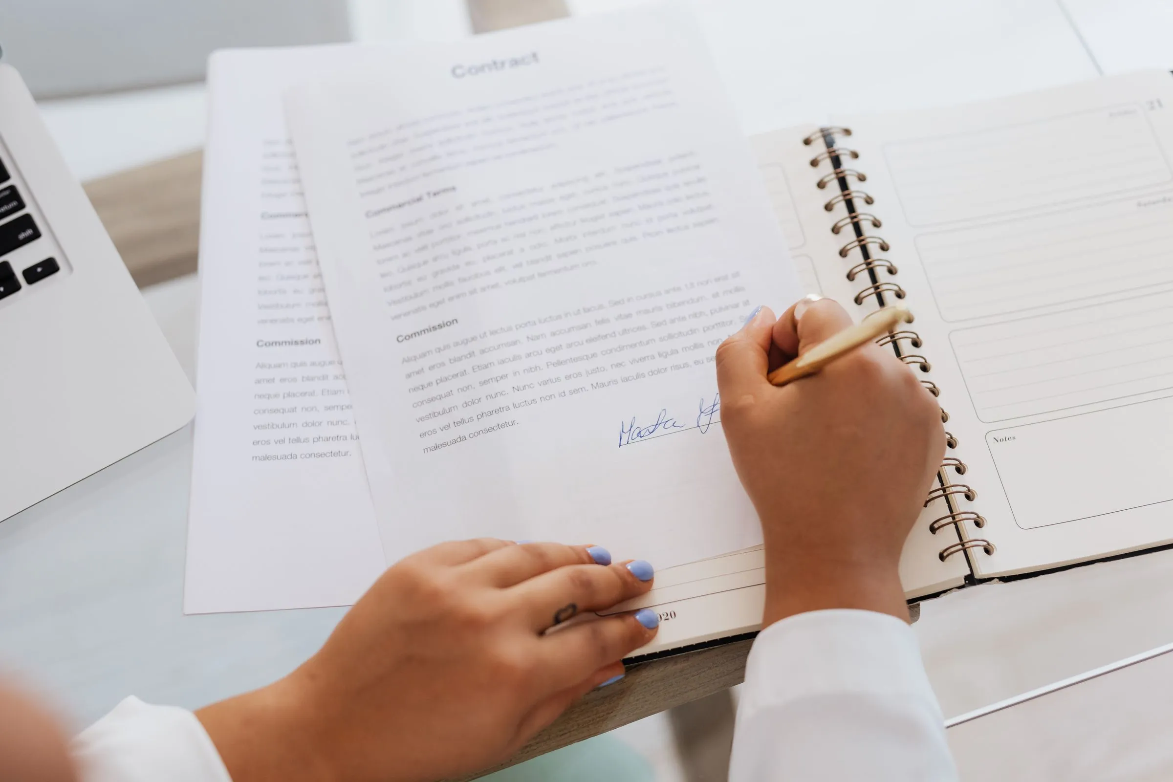 Signing a rental contract at a clean, bright desk